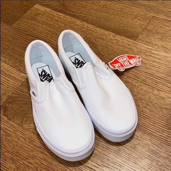 ladies white slip on vans